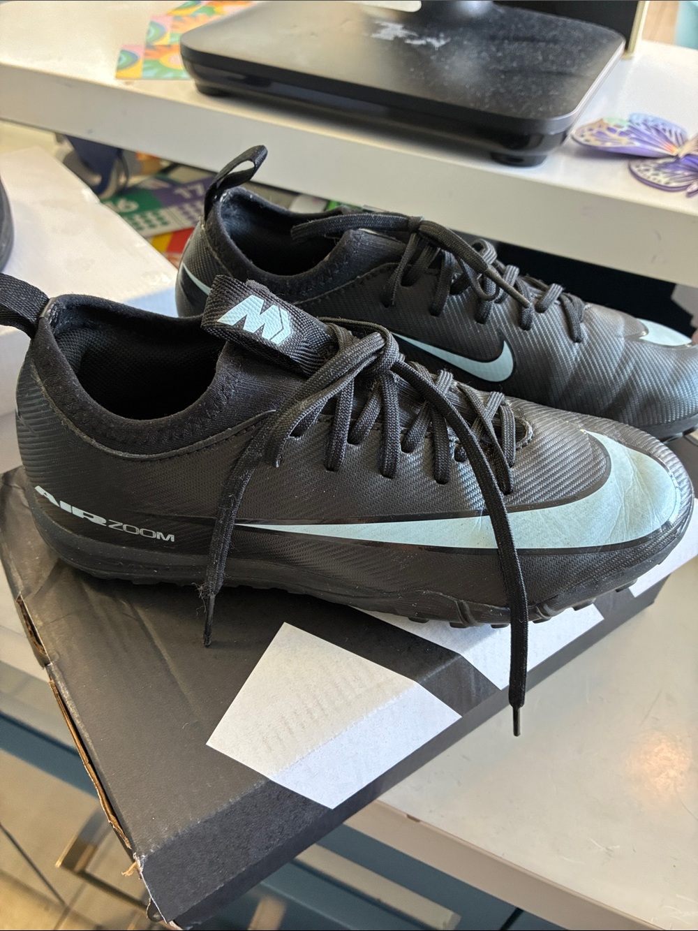 Nike boys Black Running/Cleat Sneakers with Light Blue Swoosh size 3Y
